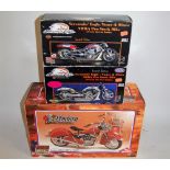 An Ertl Screamin' Eagles Harley Davidson limited edition Pro-stock bike, together with one other,