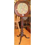 A 19th century mahogany and floral tapestry inset pole screen