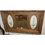 An early 20th century floral gilt framed and bevelled inset rectangular wall mirror, 51 x 81cm