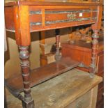 An Edwardian mahogany single drawer side table raised on turned supports width 77cm