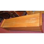 A contemporary cherry-wood long hinged top blanket box, length 157cm