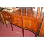 A reproduction mahogany Regency style serpentine front sideboard, width 151cm