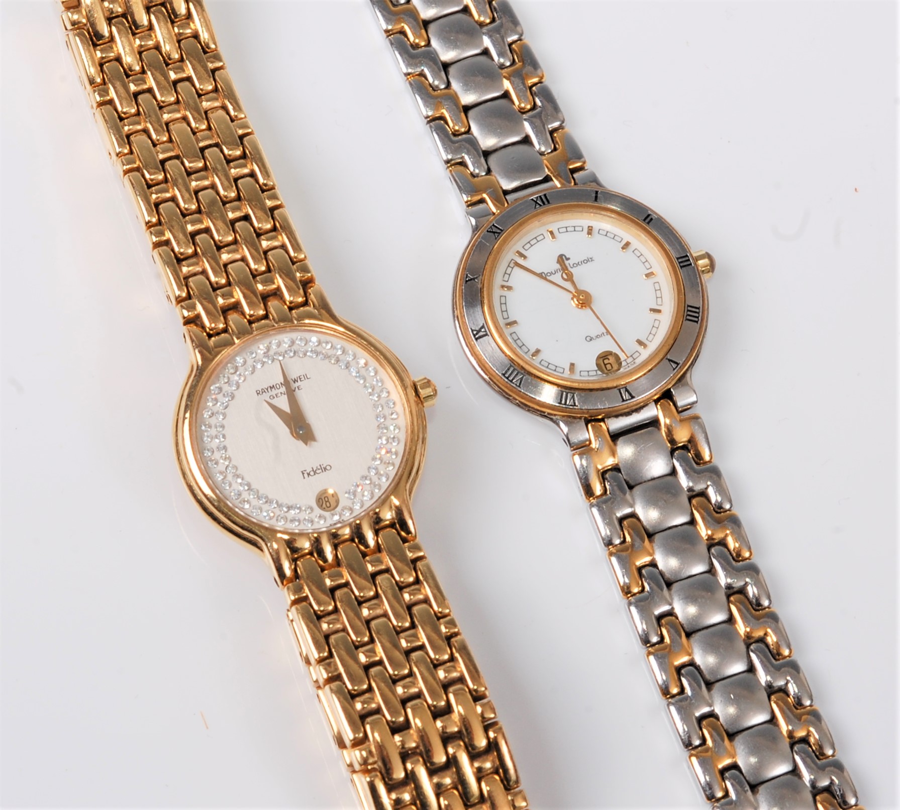 A lady's Raymond Weil gold plated waterproof quartz wristwatch, and a lady's Maurice Lacroix water