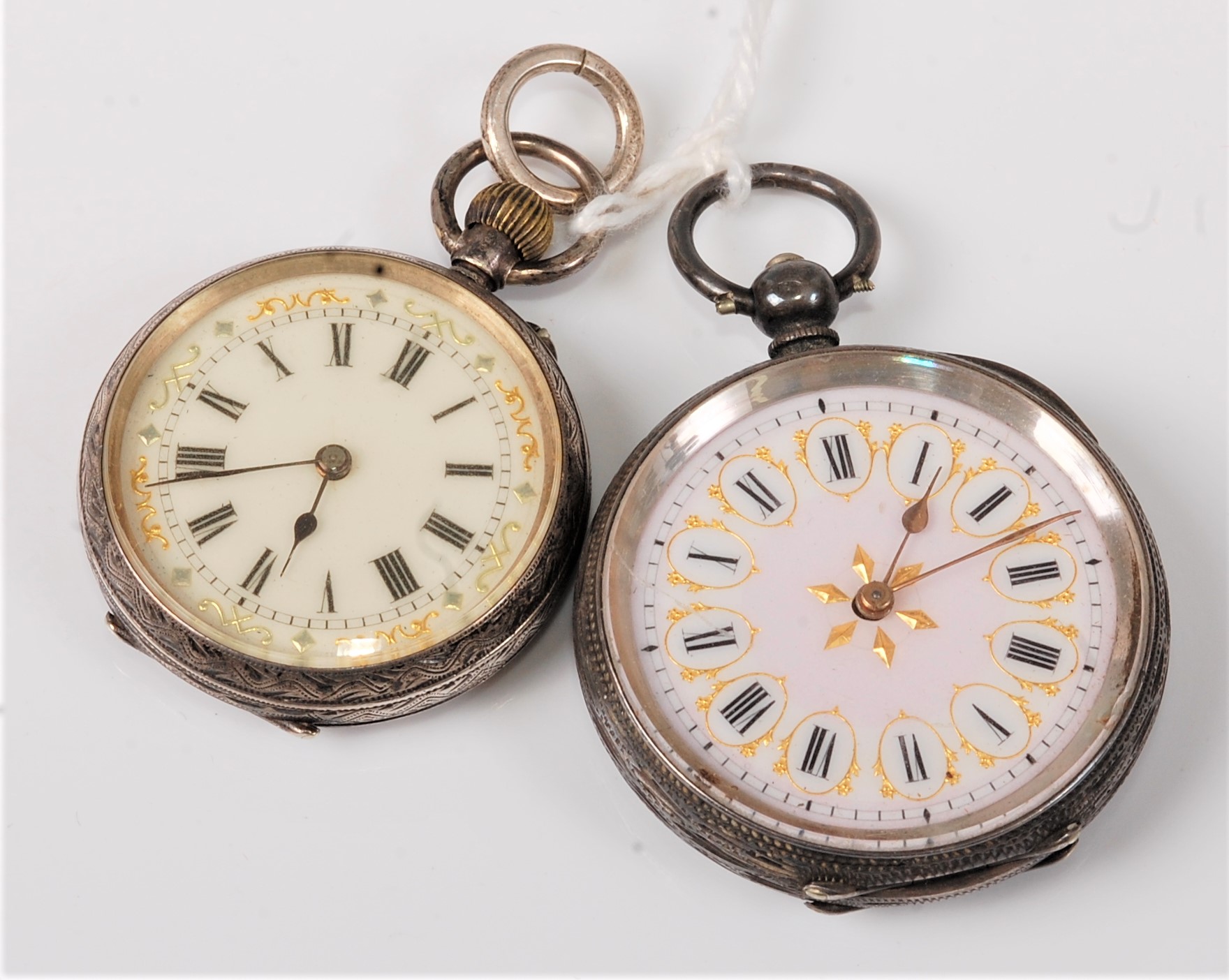 A lady's Swiss silver open faced pocket watch, stamped 0.935, 3.6cm diameter, together with a lady's