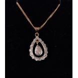 A 9ct diamond pendant, the open pear shaped pendant set with small round diamonds, in a white gold
