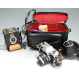 A box of miscellaneous items, to include Japanese Kowa camera and accessories, cased modern