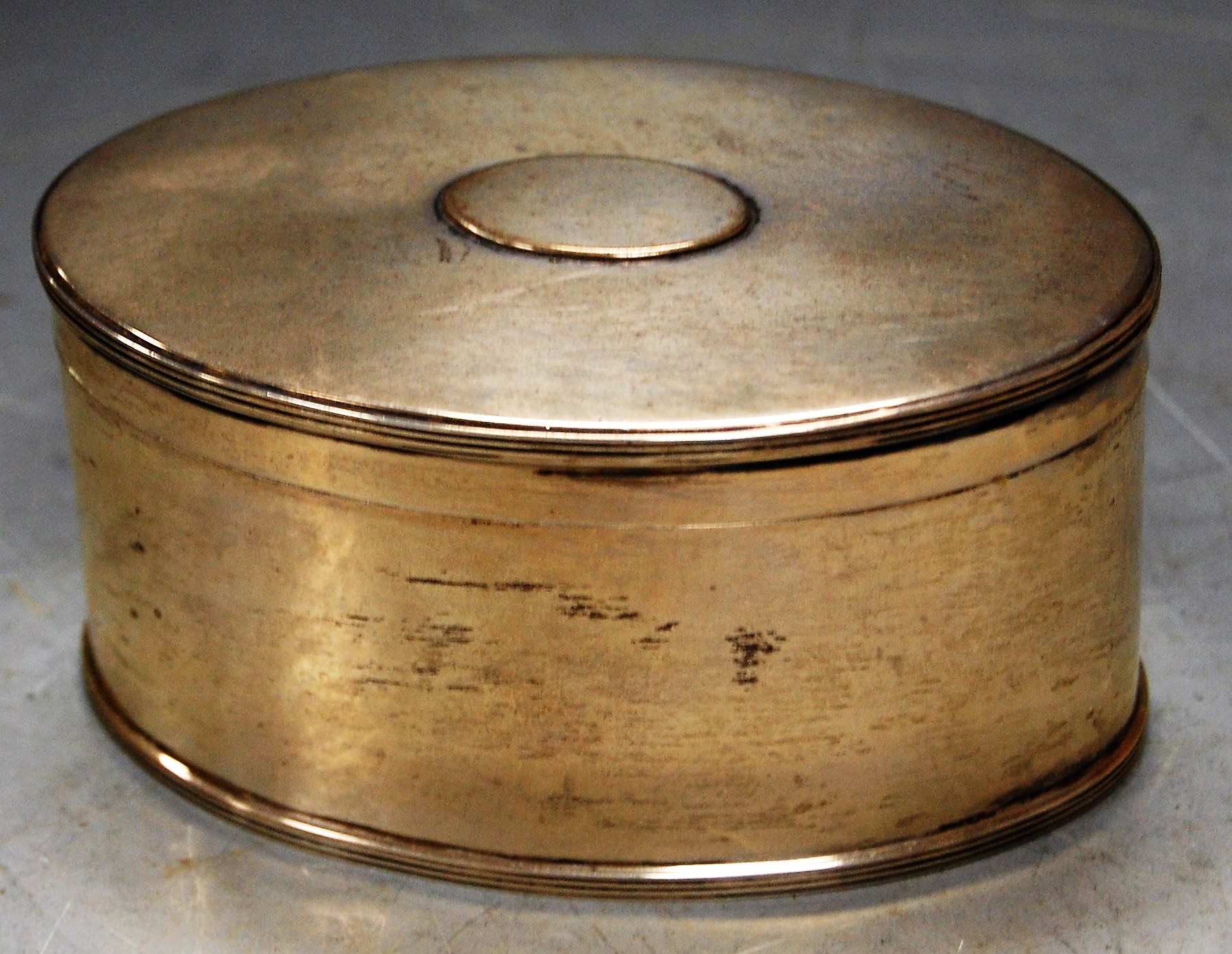 A George V silver tea canister, of undecorated oval form, maker Thomas Bradbury & Sons, 6.4oz,
