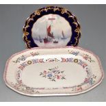 An early 20th century Royal Crown Derby cabinet plate, the centre hand painted with various