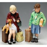 A Royal Doulton figure The Boy Evacuee, HN3202; and one other The Girl Evacuee HN3203 (2)