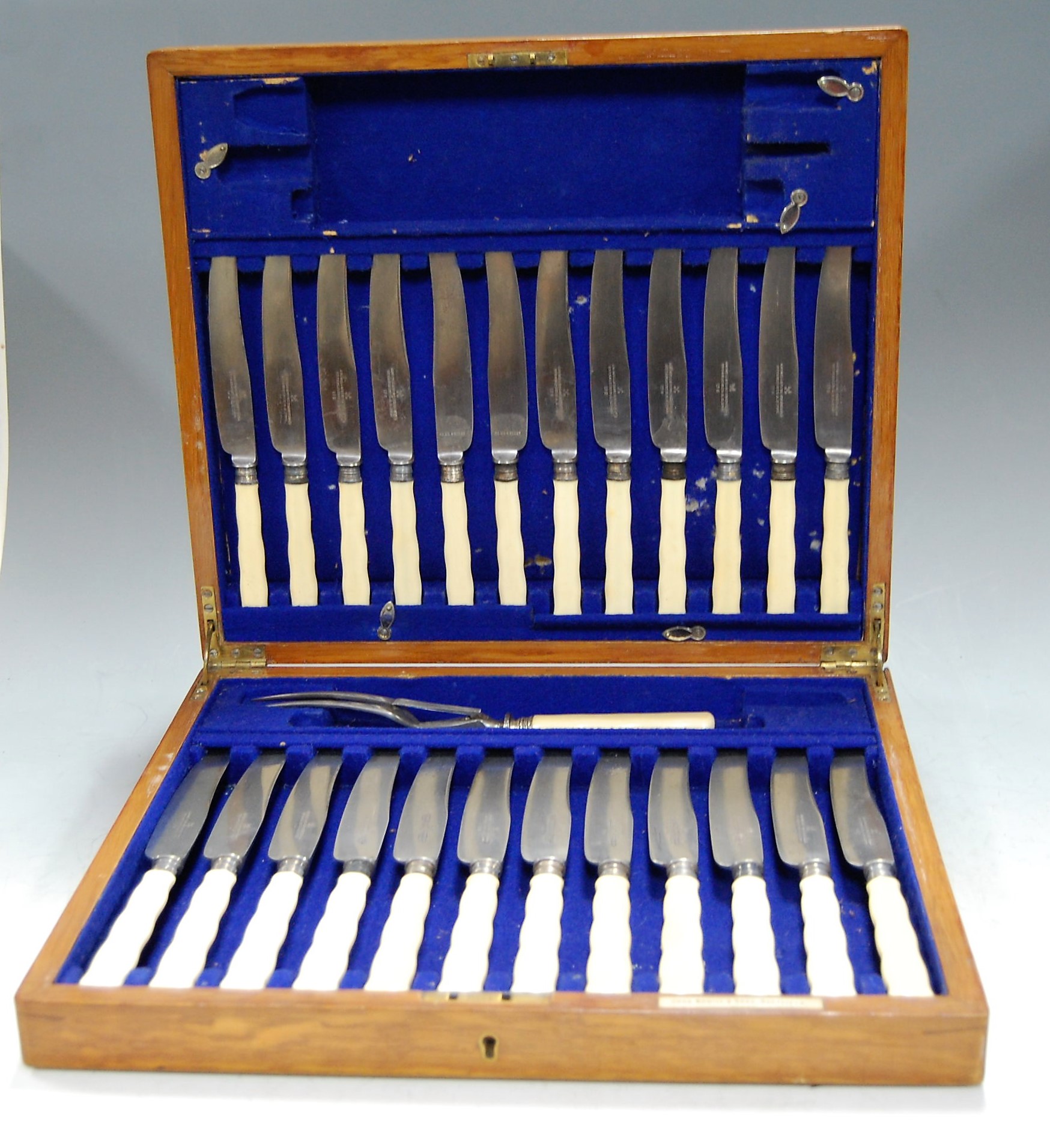 A John Nowill & Sons of Sheffield part cutlery suite, largely being table and dessert knives, in