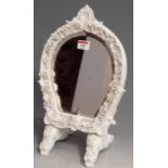 A blanc de chine floral encrusted dressing table mirror, height 39cm