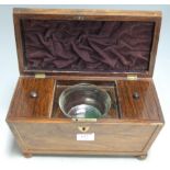 A late Regency rosewood and brass inlaid tea caddy, of sarcophagus form