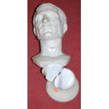 A large Parian head & shoulders portrait bust of Caesar on a socle base (heavily a/f)