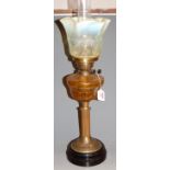 A Victorian pedestal oil lamp, having vaseline glass shade to clear glass font on brass pedestal
