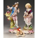 A pair of Continental porcelain figures, each decorated in the 18th century style, h.29cm;