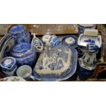 A box containing a quantity of mixed make blue and white china, to include a Ringtons by Wade