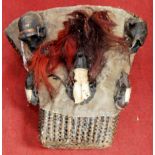 A late 19th/early 20th century Kanyak 'head-taking' basket with monkey skulls, Nagaland, Assam,