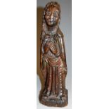 An 18th century Flemish carved oak figure of a lady in standing pose, h.32cm