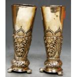 A pair of late Victorian silver and embossed specimen vases, Birmingham 1891, h.12cm