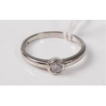 A diamond solitaire ring, the round brilliant cut diamond estimated approx. 0.25cts, collet