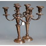A pair of Old Sheffield Plate three sconce candelabra