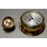 A miniature brass cased ships style clock having silvered dial with roman numerals signed Celeste, 8