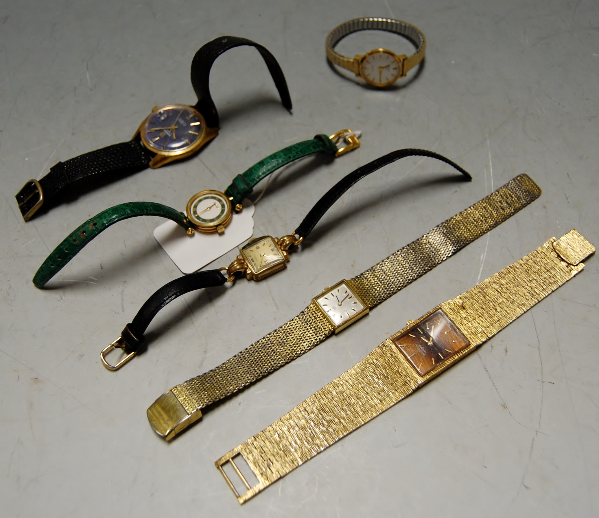 A ladies gilt metal cased and steel backed Rotary wrist watch having enamel dial, baton markers