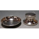 A modern silver capstan inkwell together with a small silver commemorative dish by Garrards (2)