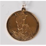 A silver gilt pendant, with horse and foal on one side and Mothers Day 1975 on the other, hallmarked