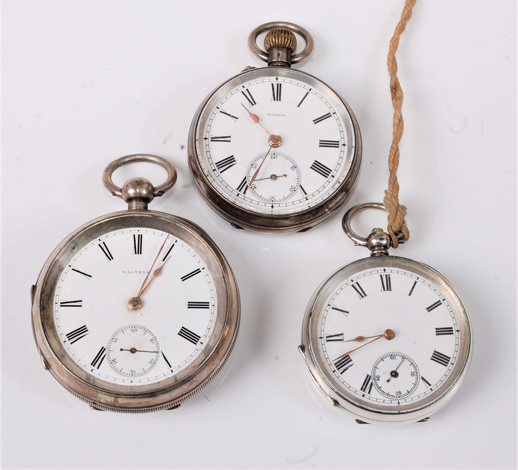 A silver pocket watch by Waltham, Birmingham 1909, an 0.835 Swiss pocket watch by Moeris, and an 0.