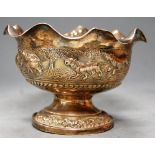A white metal pedestal footed bowl, chased with wild animals, indistinctly marked, 4.2oz, dia. 13cm