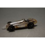 A modern continental silver miniature model of a racing car, length 9cm