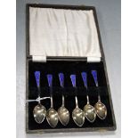 A cased set of six silver and enamelled teaspoons