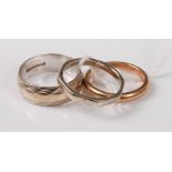 Three 9ct gold wedding bands, (9.8g gross)