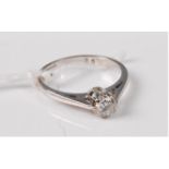 An 18ct white gold diamond solitaire ring, the round brilliant cut diamond, estimated approx. 0.