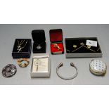 A box of mixed costume jewellery to include some silver, faux pearls, beads, gilt metal chains,