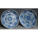 A pair of 19th century Chinese export plates having typical under glaze blue and blue & white