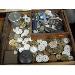 A large collection of assorted pocket watch parts, wristwatches etc