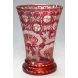 A circa 1900 cranberry overlaid and acid etched trumpet form vase, 13.5cm