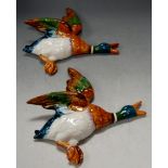 A pair of Beswick wall mounted flying ducks, each numbered 596 -2