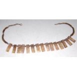 A 20th century North African hammered copper necklace
