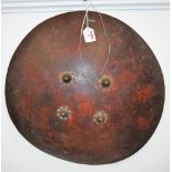 A 19th century Ethiopian / Sudanese shield, having brass studded detail, dia. 53cm