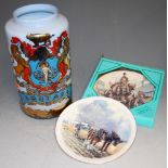 A large early 20th century blue glass rhubarb vase, having painted heraldic shield and rhubarb