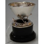 A small George V silver golfing trophy