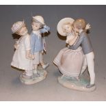 A Lladro porcelain figure of a dancing couple, indistinctly numbered, h.24cm; and one other of a