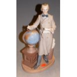 A Lladro porcelain figure group of a scholar standing beside a globe, impressed number F.27J, h.