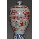 A Chinese porcelain vase, of baluster form, decorated with figure scenes in shades of iron-red,