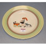 An Art Deco dinner plate, decorated with printed scene of a young girl with pram and attendant