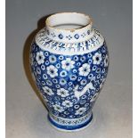 A circa 1800 Delft vase, decorated with deer on a blue ground, h.28cm