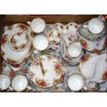 A box of Royal Albert Old Country Roses tea and coffee wares